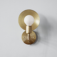 Orbit Sconce in Hewn Brass